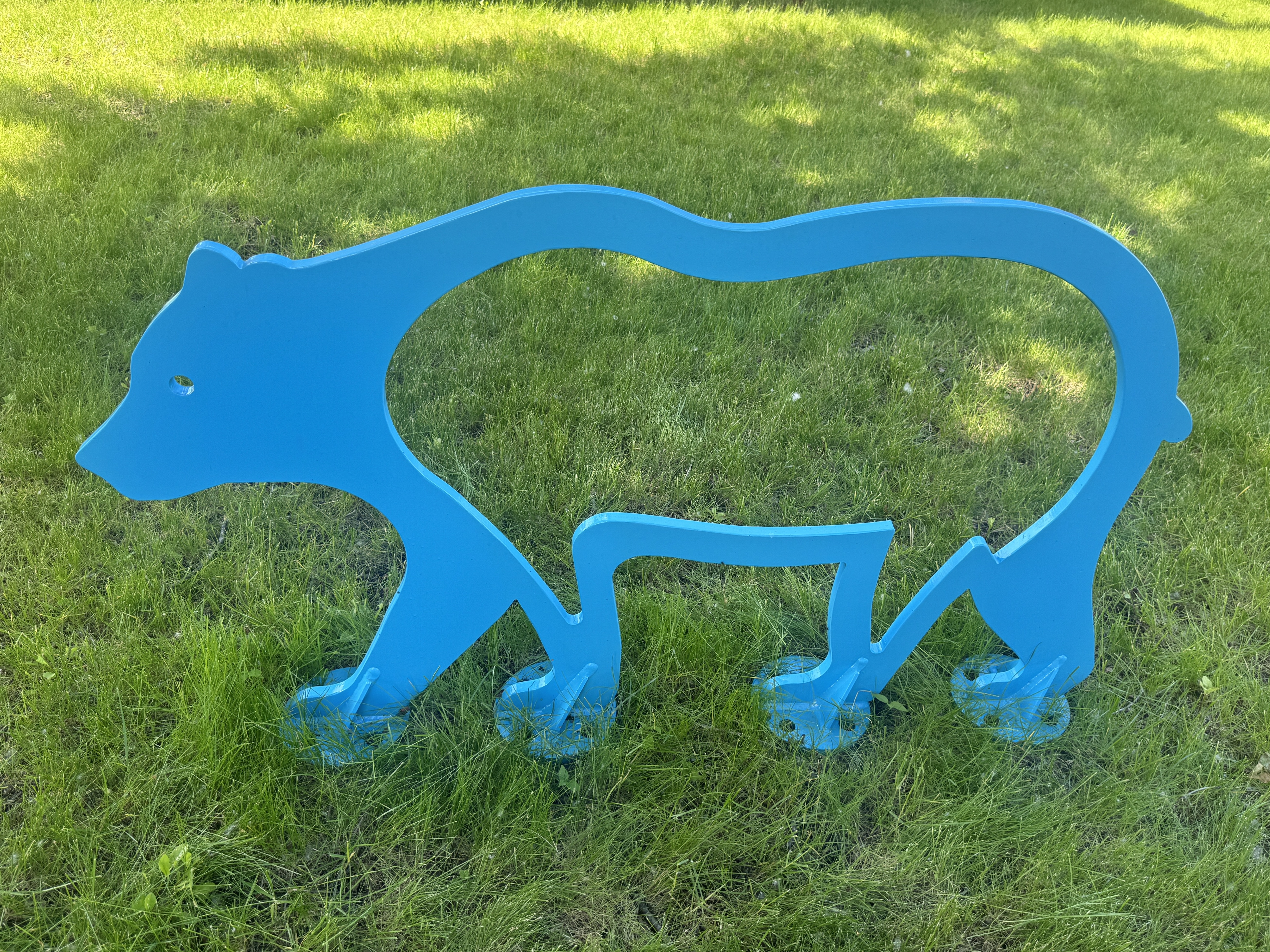 Bear sculpture and bike rack created for Chanshtnu Muldoon Park in Northeast Anchorage, Alaska.
