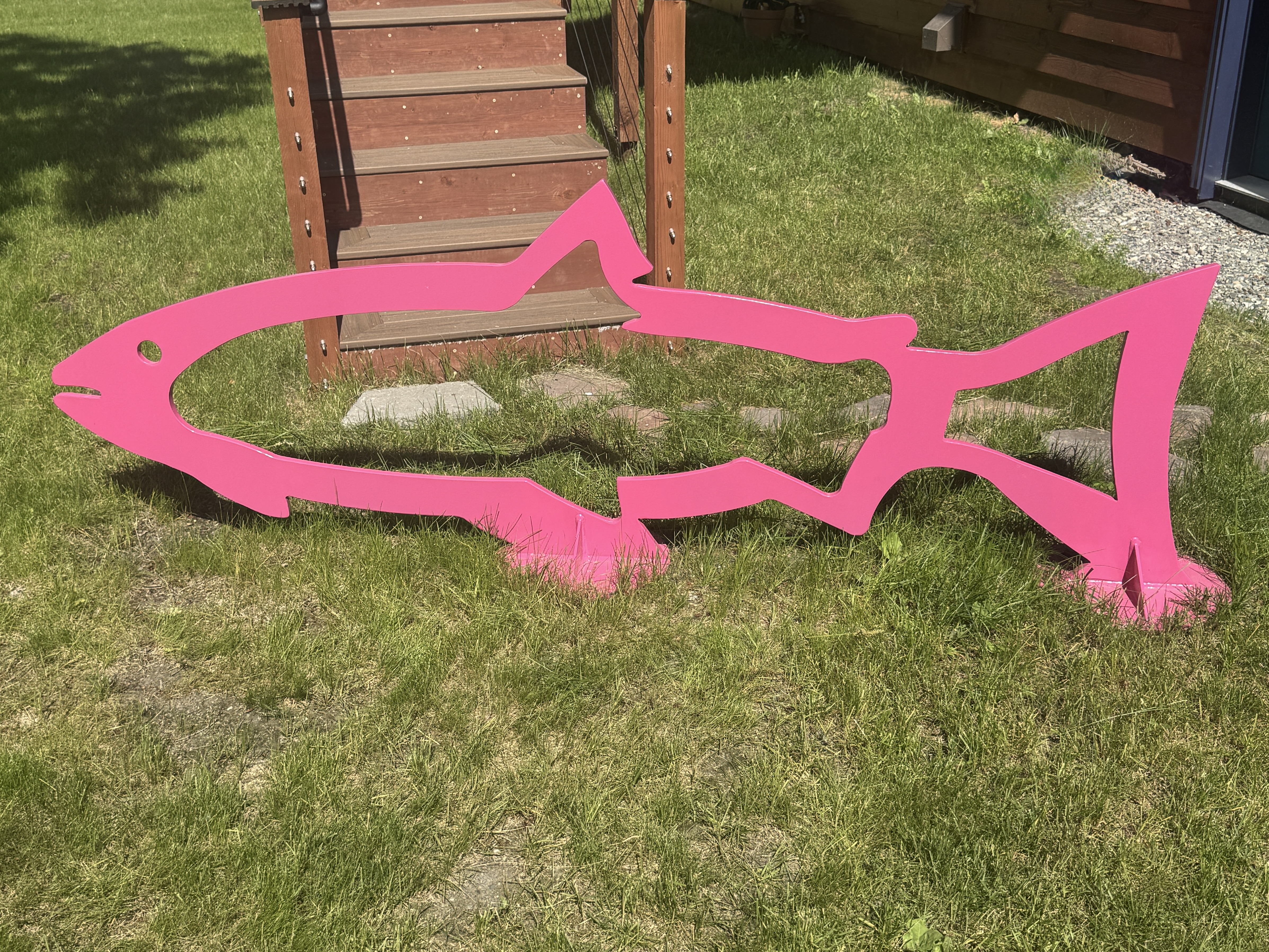 Salmon sculpture and bike rack created for Chanshtnu Muldoon Park in Northeast Anchorage, Alaska.